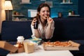 Portrait of caucasian female looking into camera holding beer bottle in hands Royalty Free Stock Photo