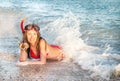 Portrait of caucasian girl at the beach with snorkeling mask and Royalty Free Stock Photo