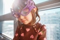 Portrait of Caucasian girl chil with funny glasses Royalty Free Stock Photo