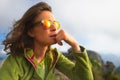 Portrait of caucasian girl resting during an alpine trekking