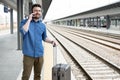 Portrait of caucasian male in railway train station Royalty Free Stock Photo