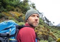 Portrait of caucasian man with backpack in Makalu Barun Park route near Khare. Mera peak climbing acclimatization active walk.