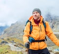 Portrait of caucasian man with backpack and trekking poles in Makalu Barun Park route near Khare. Mera peak climbing Royalty Free Stock Photo