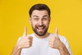 Portrait of caucasian man with big beard in white shirt. Bearded man shows thumbs up