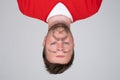 Portrait on caucasian man with face uside down. I feel strange concept.