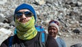 Portrait of caucasian Mountain Climber and nepalese Guide