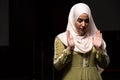 Portrait of a Caucasian muslim woman wearing the Islamic Long Hijab Khimar inside a mosque