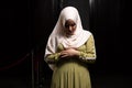Portrait of a Caucasian muslim woman wearing the Islamic Long Hijab Khimar inside a mosque