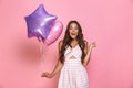 Portrait of caucasian pleased girl 20s with long hair wearing dr Royalty Free Stock Photo