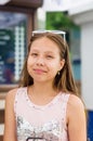 Smiling teenage girl in sunglasses on summer day Royalty Free Stock Photo