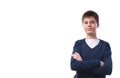 Portrait of caucasian teen boy on white background with folded arms. Royalty Free Stock Photo