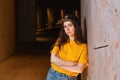 Portrait of caucasian teen girl posing on a night street. Outdoor. Copy space. The concept of youth subculture