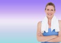 Portrait of caucasian woman with towel around her neck smiling against purple gradient background Royalty Free Stock Photo