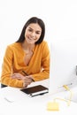 Portrait of caucasian young designer woman using graphic tablet computer and stylus pen in bright office Royalty Free Stock Photo
