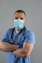 Portrait of caucasian young male doctor in blue uniform with stethoscope isolated Royalty Free Stock Photo