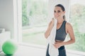 Portrait of charming active sports girl have rest after intense warm-up rub her neck with soft comfort towel feel