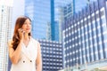 Portrait charming beautiful young businesswoman. Attractive business woman call customer for telling good news. Pretty girl looks Royalty Free Stock Photo