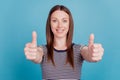 Portrait of charming cheerful cute adorable lady raise thumb up reliable agreement on blue background