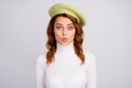 Portrait of charming cheery wavy-haired girl sending you air kiss isolated over light gray white pastel color background Royalty Free Stock Photo