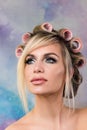 Portrait of charming girl in curlers Royalty Free Stock Photo