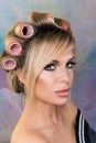 Portrait of charming girl in curlers Royalty Free Stock Photo