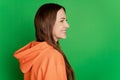 Portrait of charming gorgeous teenager lady shiny white smile on green background