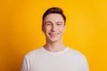 Portrait of charming handsome positive guy toothy beaming smile look camera on yellow background Royalty Free Stock Photo