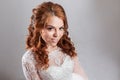 Portrait of a charming red-haired bride, Studio, close-up. Royalty Free Stock Photo