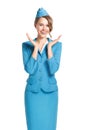 Portrait of charming stewardess wearing in blue uniform. Royalty Free Stock Photo