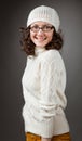 Portrait of a charming young smiling brunette wearing chochet ha Royalty Free Stock Photo