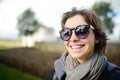 Portrait of charming young woman in sunglasses outdoors. Health, beauty, positive emotions, joy of life. Single travel