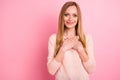 Portrait of charming youth hands palms chest good-looking over pink background