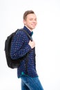 Portrait of cheeful happy young blond student with backpack