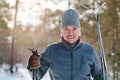 Happy Senior Man With Skis In Park Royalty Free Stock Photo