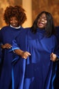 Portrait of Cheerful African American Woman in Blue Robe in Sunday Church, Singing Passionately Royalty Free Stock Photo