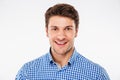 Portrait of cheerful attractive young man in checkered shirt Royalty Free Stock Photo