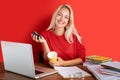 Portrait of cheerful blonde lady having fun at work place isolated Royalty Free Stock Photo