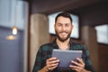 Portrait of cheerful businessman holding digital tablet Royalty Free Stock Photo