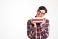 Portrait of a cheerful casual male student in eyeglasses Royalty Free Stock Photo