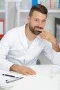 Portrait cheerful doctor wearing white labcoat