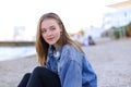 Portrait of cheerful girl who poses on camera and cute laughs si Royalty Free Stock Photo