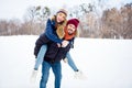 Portrait of cheerful glad man hold on back positive adorable girl toothy smile look camera have good mood outdoors Royalty Free Stock Photo