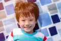 Portrait cheerful handsome little boy. Attractive handsome mix race kid gets enjoying life and gets happiness. Cute child look