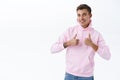 Portrait of cheerful handsome young man, being supportive friend, show thumbs-up you cand do it, encourage make action