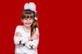 Portrait of cheerful little girl in very big glasses and white bow Royalty Free Stock Photo