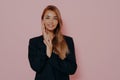 Portrait of cheerful long haired businesswoman in black formal jacket Royalty Free Stock Photo