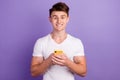 Portrait of cheerful man modern device user use smart phone type social network message over bright background Royalty Free Stock Photo