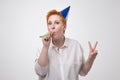 Portrait of a cheerful mature woman celebrating her birthday Royalty Free Stock Photo