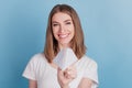 Portrait of cheerful nice attracitve lady hold send paper plane toothy smile on blue background