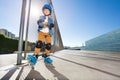 Young inline skater standing at outdoor rollerdrom Royalty Free Stock Photo